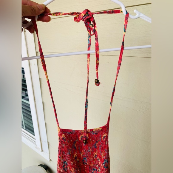 Floral Split front romper with attached shorts and smock halter top. - Picture 12 of 13
